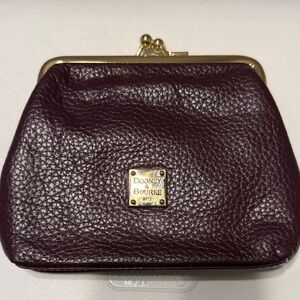 Dooney & Bourke Dark burgundy Leather Kisslock wallet.